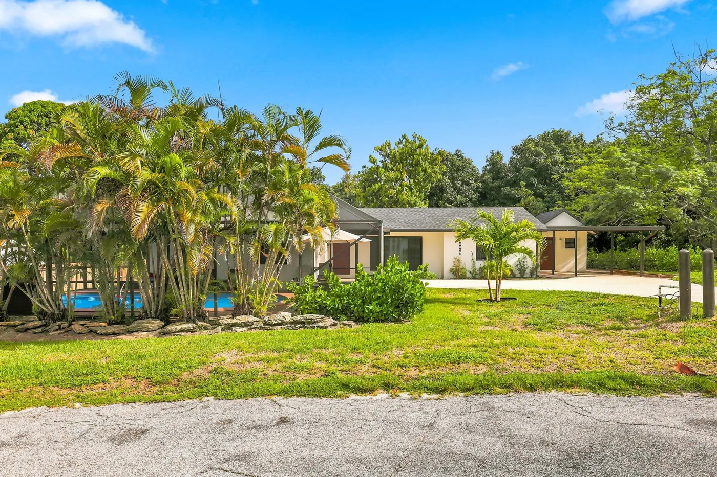 Front of the house and private driveway