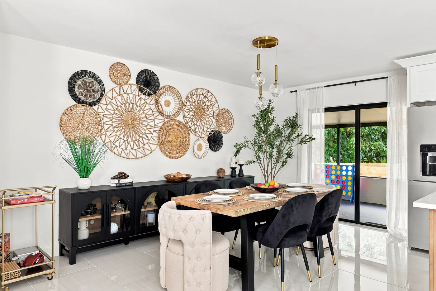 Dining room with a rattan wall treatment