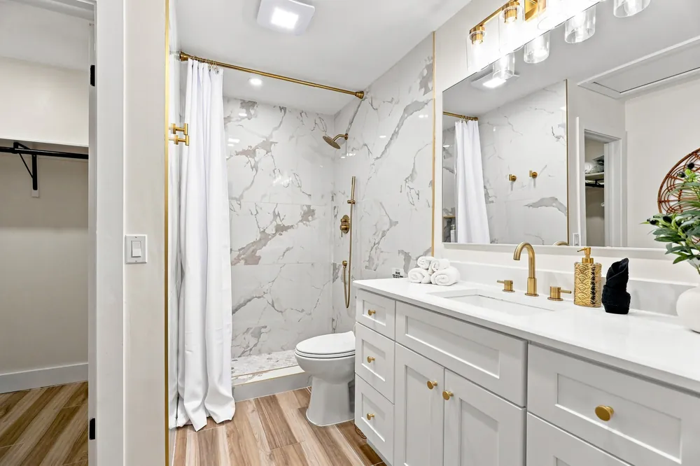 Marble bathroom with brass fixtures